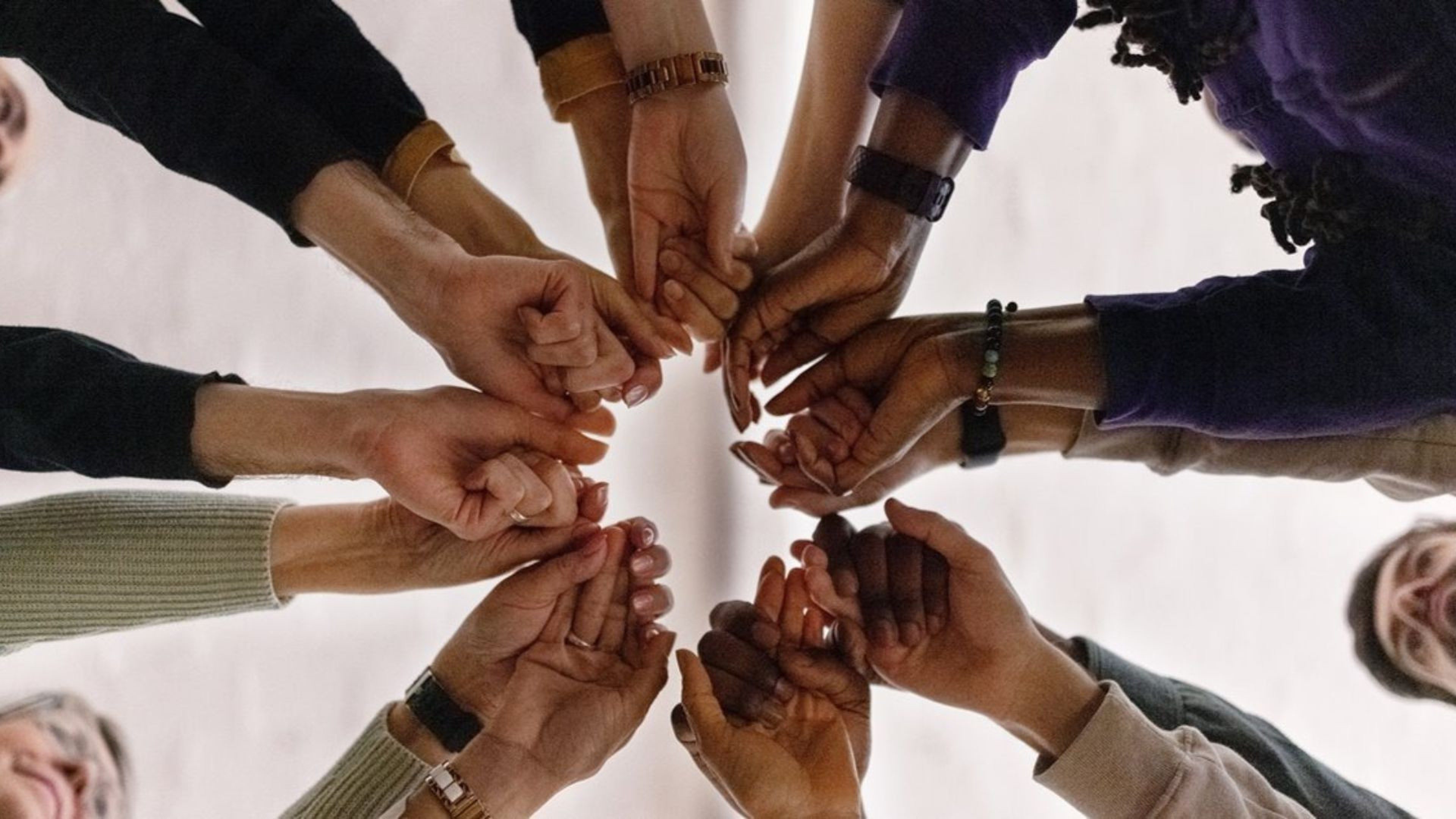 Hands forming a circle