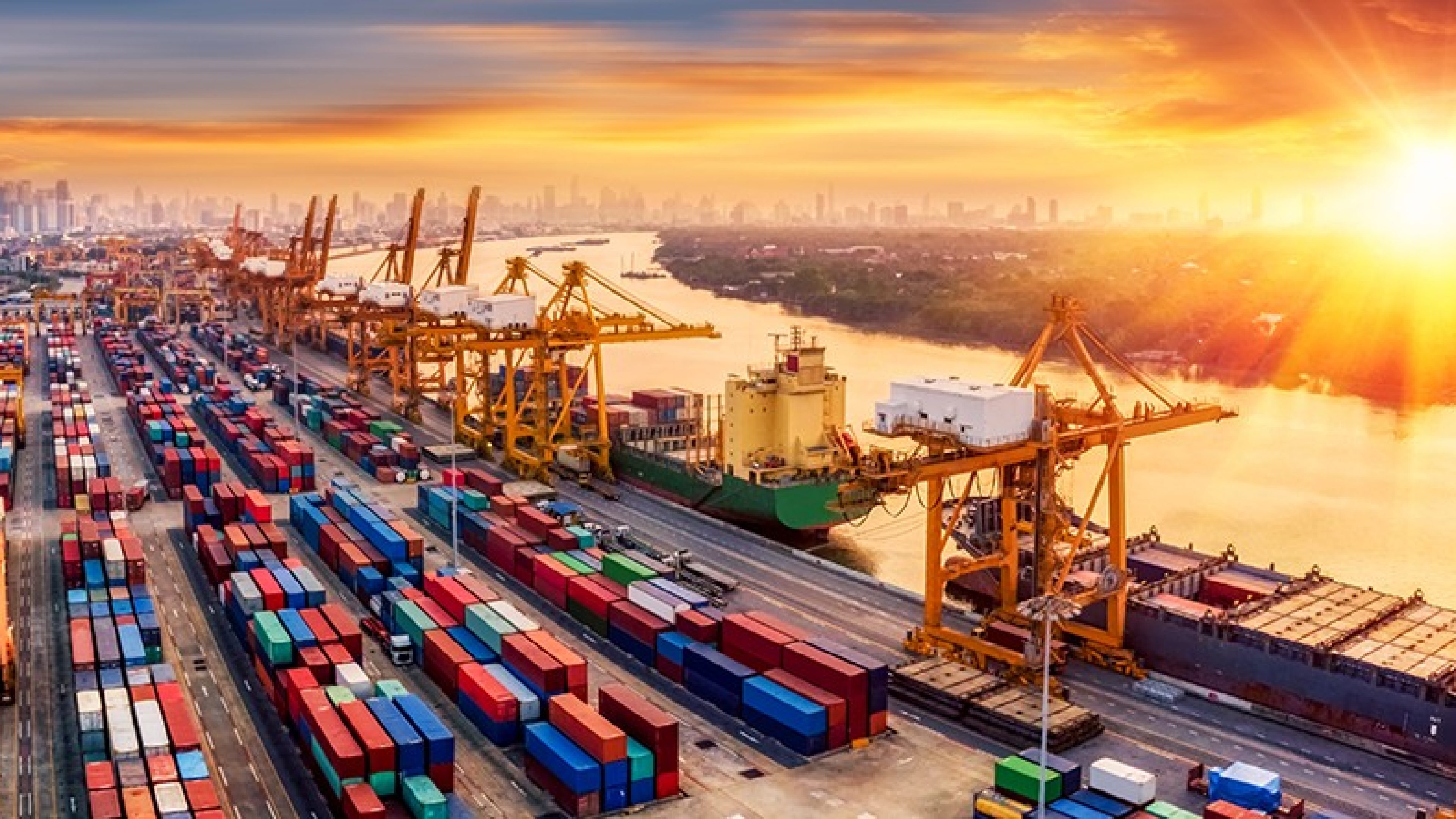 Logistics and transportation of Container Cargo ship and Cargo plane with working crane bridge in shipyard at sunrise, logistic import export and transport industry background