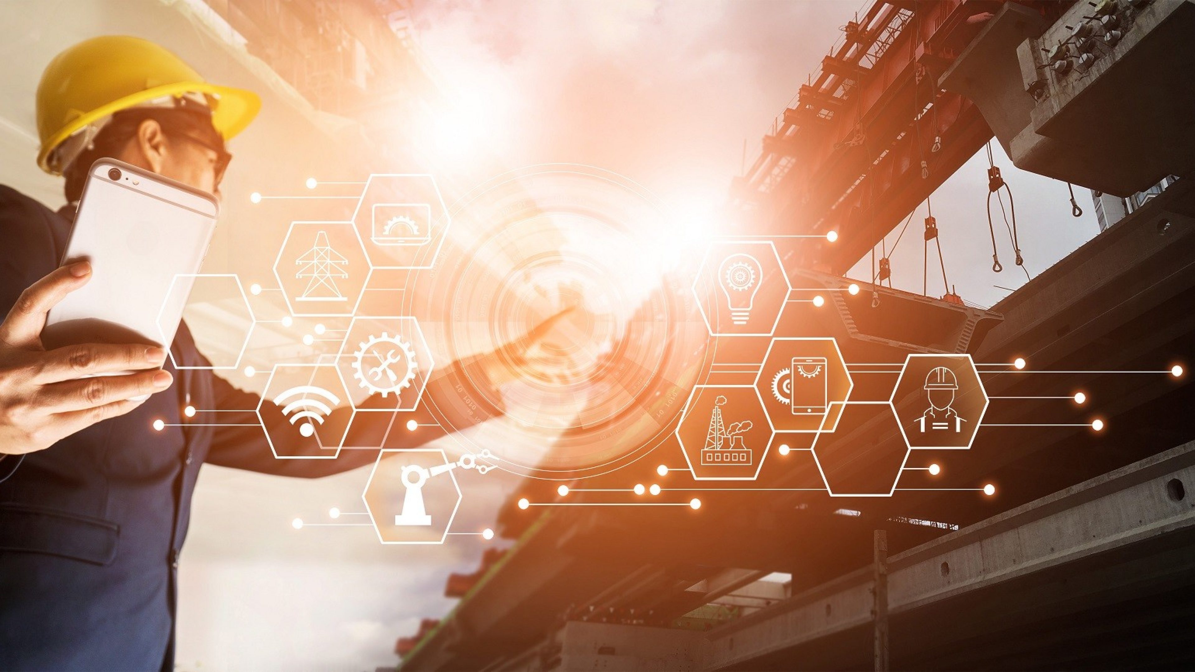 Un architecte futuriste, gestionnaire utilisant un smartphone mobile avec connexion réseau icône sur le chantier