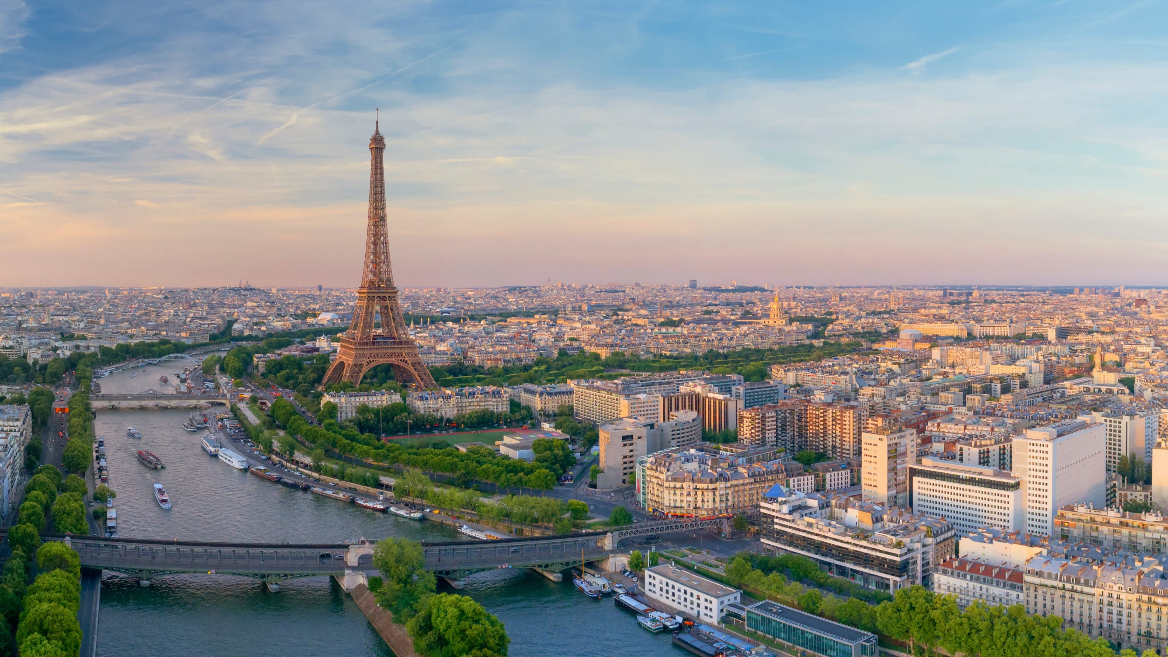 Aerial view of Paris with Eiffel tower during sunset